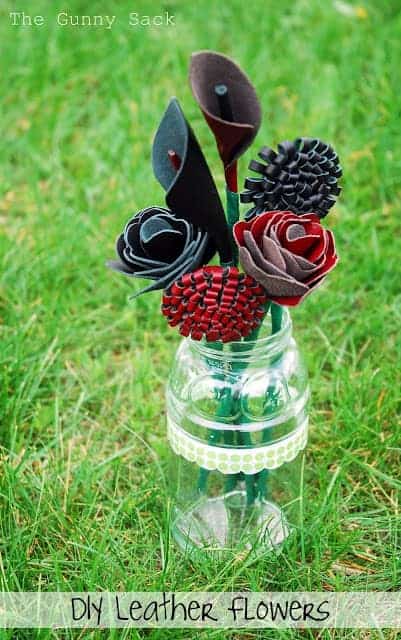 Homemade leather flowers in a jar.