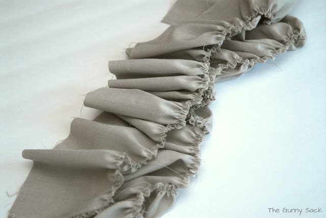 gray ruffled fabric.