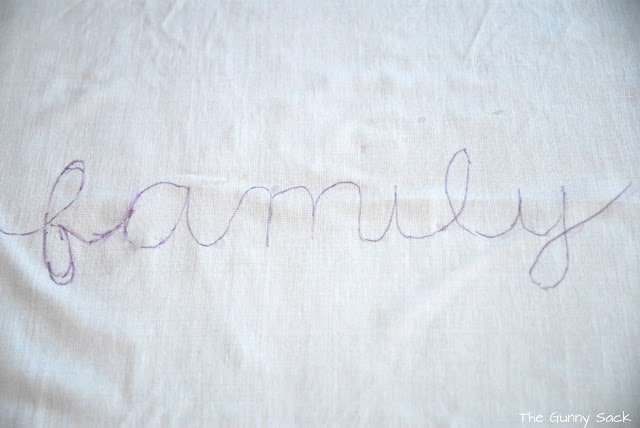 fabric with the word family written on it.
