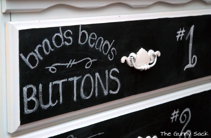 Chalk lettering on a drawer.