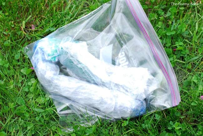 a freshly dyed cloth tote bag wrapped in plastic.