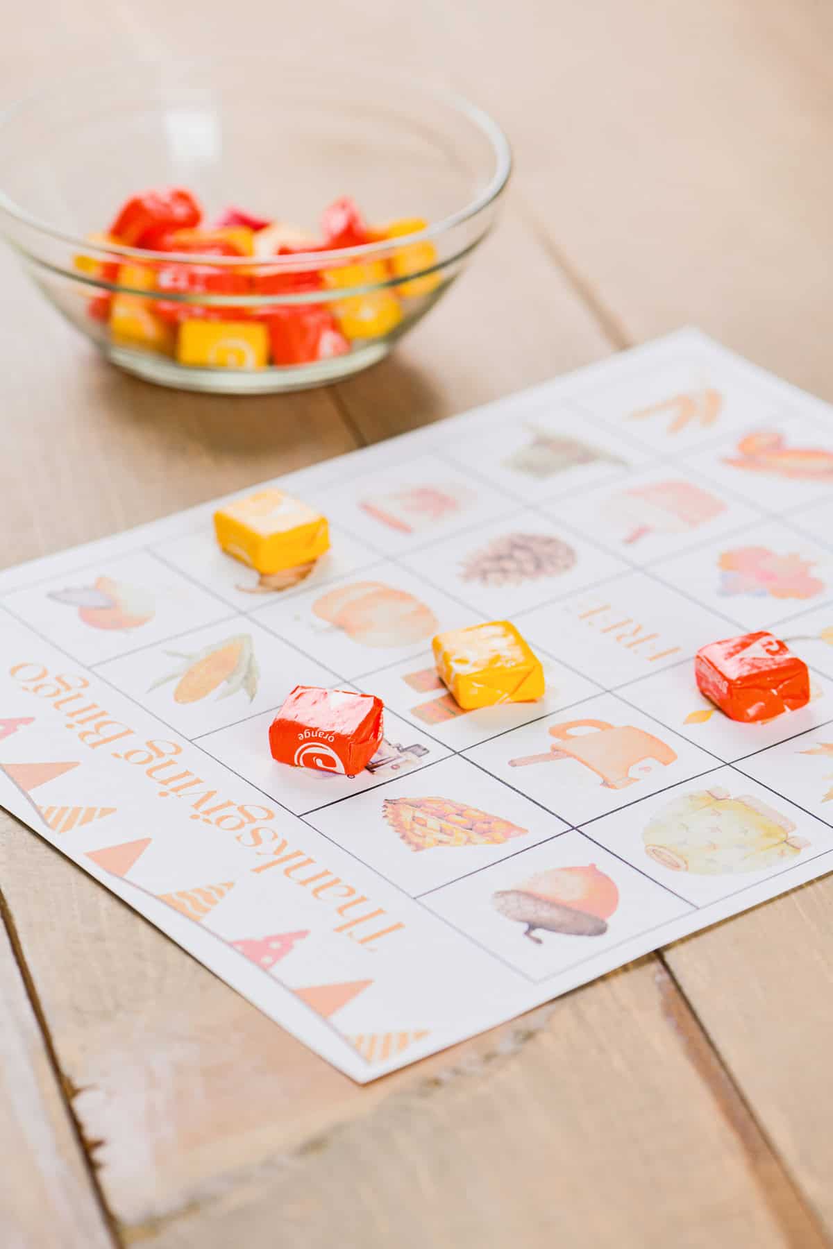 A Thanksgiving Bingo playing card with candy.